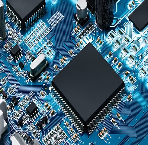 Electronic circuit board with processor, close up.