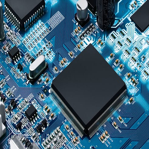 Electronic circuit board with processor, close up.